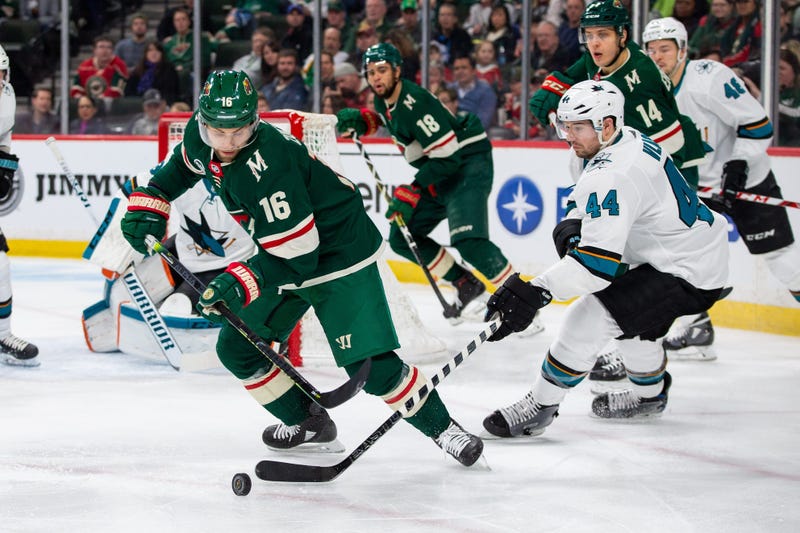 Zucker controls the puck