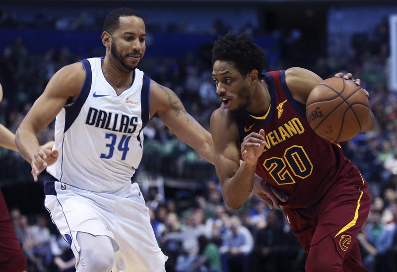 Mar 16, 2019; Dallas, TX, USA; Cleveland Cavaliers guard Brandon Knight (20) drives to the basket as Dallas Mavericks guard Devin Harris (34) defends during the first half at American Airlines Center. Mandatory Credit: Kevin Jairaj-USA TODAY Sports