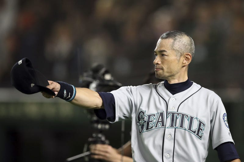 Seattle Mariners right fielder Ichiro Suzuki (51) tips his cap after being removed from the game during the eighth inning against the Oakland Athletics at Tokyo Dome.