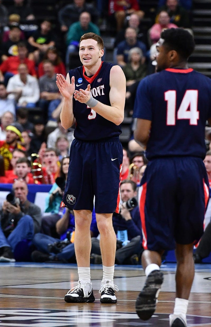 Mar 21, 2019; Jacksonville, FL, USA; Belmont Bruins guard Dylan Windler (right) reacts with a teammate after a loss to the Maryland Terrapins in the first round of the 2019 NCAA Tournament at Jacksonville Veterans Memorial Arena. Mandatory Credit: John Da