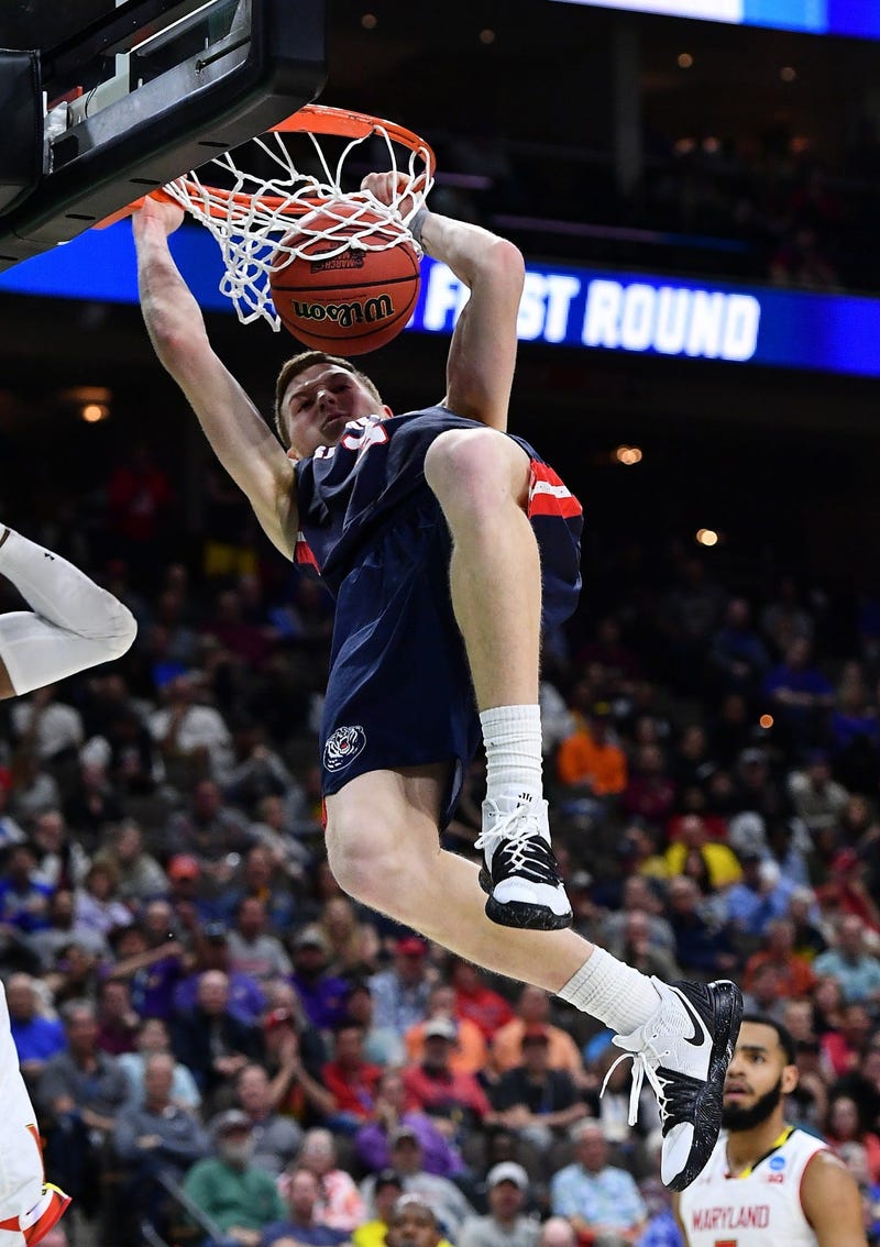 Mar 21, 2019; Jacksonville, FL, USA; Belmont Bruins guard Dylan Windler (right) reacts with a teammate after a loss to the Maryland Terrapins in the first round of the 2019 NCAA Tournament at Jacksonville Veterans Memorial Arena. Mandatory Credit: John Da