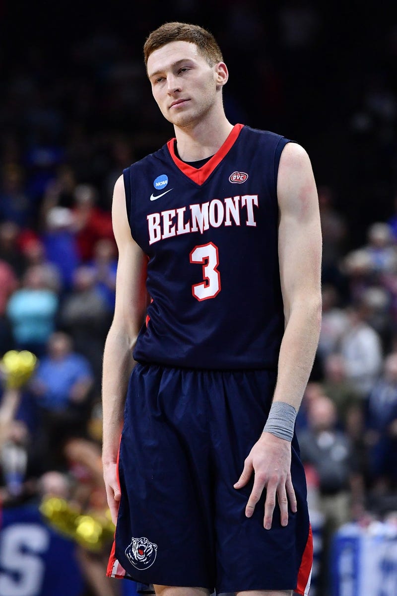 Mar 21, 2019; Jacksonville, FL, USA; Belmont Bruins guard Dylan Windler (right) reacts with a teammate after a loss to the Maryland Terrapins in the first round of the 2019 NCAA Tournament at Jacksonville Veterans Memorial Arena. Mandatory Credit: John Da