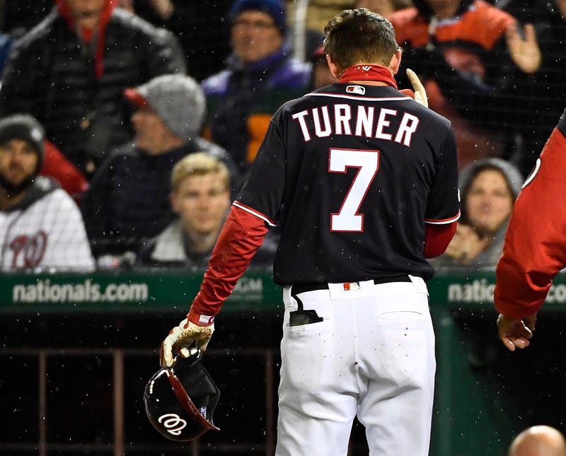 Nationals shortstop Trea Turner walks off the field after suffering an injury.