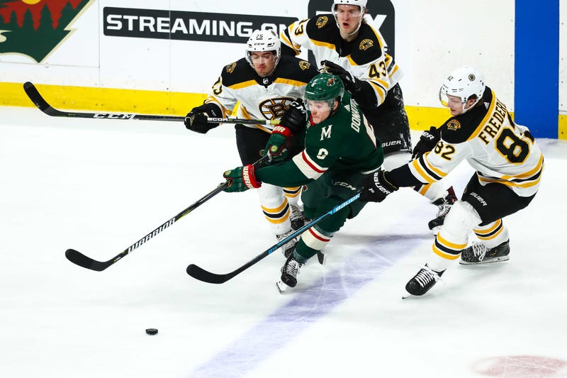 Wild forward Ryan Donato takes on the Bruins
