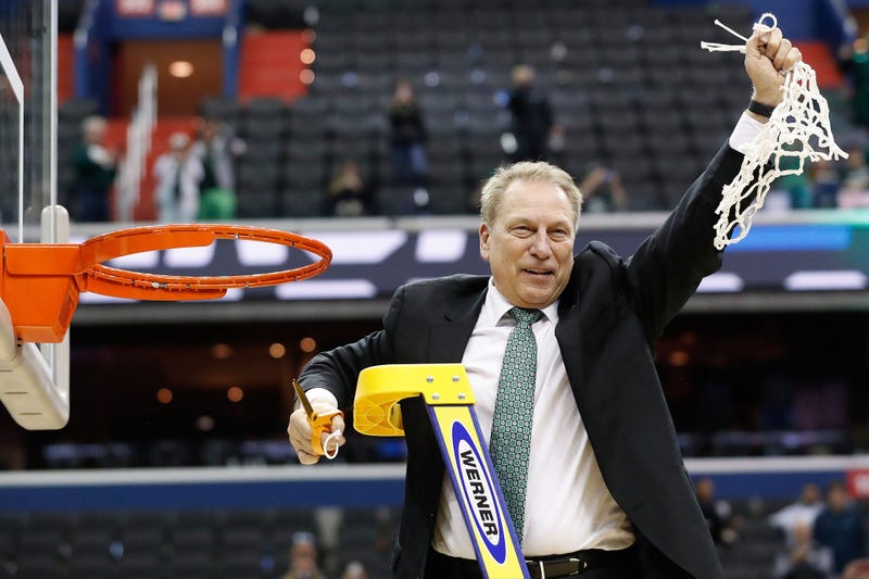 Michigan State Spartans head coach Tom Izzo cuts down the net after the Spartans' game against the Duke Blue Devils in the championship game of the east regional of the 2019 NCAA Tournament at Capital One Arena.