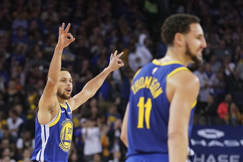 April 5, 2019; Oakland, CA, USA; Golden State Warriors guard Stephen Curry (30) and guard Klay Thompson (11) celebrate after a made three-point basket against the Cleveland Cavaliers during the second quarter at Oracle Arena. 