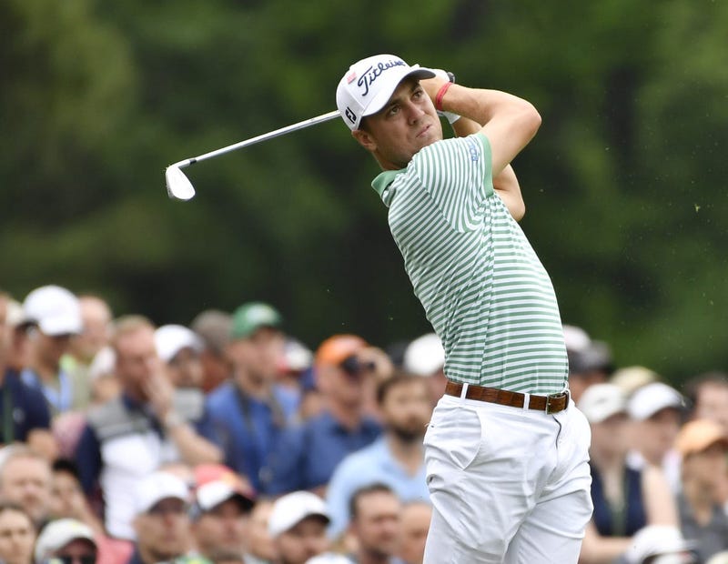 Justin Thomas hits his tee shot on the 12th hole during the final round of The Masters