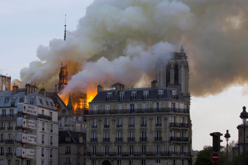 The roof of Notre Dame Cathedral is on fire.