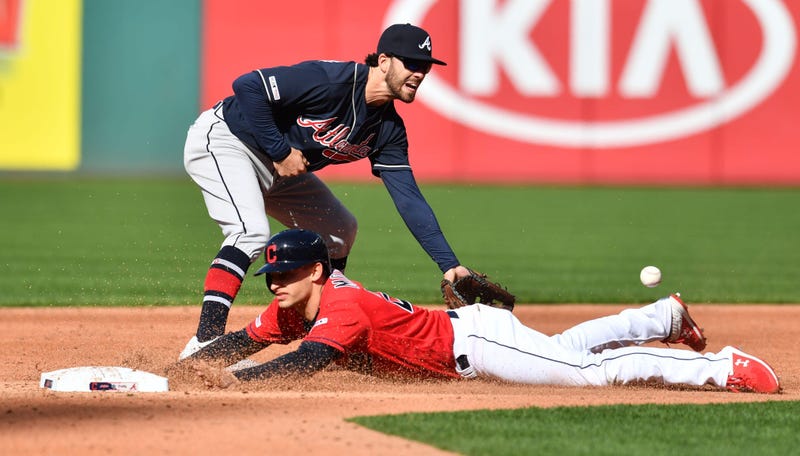 Apr 20, 2019; Cleveland, OH, USA; Cleveland Indians shortstop Max Moroff (26) steals second as Atlanta Braves shortstop Dansby Swanson (7) waits for the throw during the second inning at Progressive Field. Mandatory Credit: Ken Blaze-USA TODAY Sports