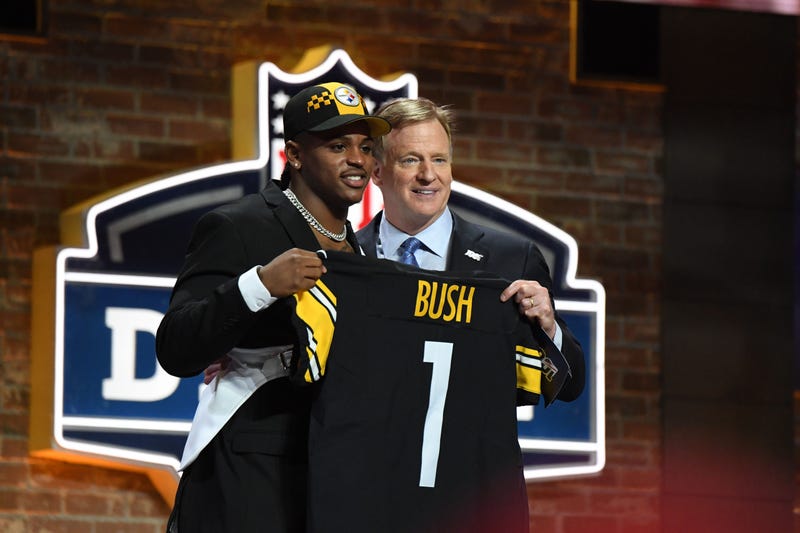 Devin Bush with Roger Goodell