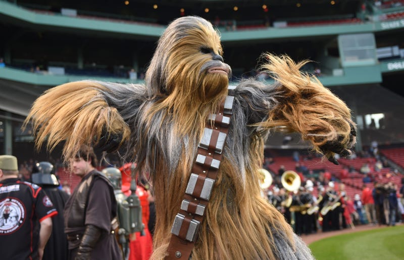 Apr 25, 2019; Boston, MA, USA; Star Wars character Chewbacca works Apr 25, 2019;on his throwing motion as part of Star Wars night prior to a game between the Boston Red Sox and Detroit Tigers at Fenway Park. Mandatory Credit: Bob DeChiara-USA TODAY Sports