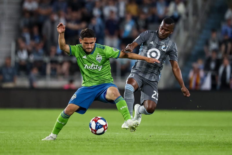 Cristian Roldan and Darwin Quintaro