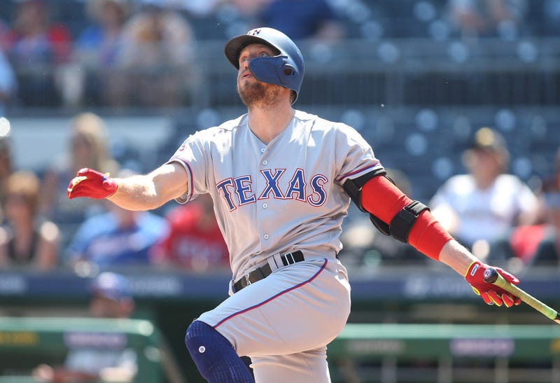 Texas Rangers pinch hitter Hunter Pence (24) hits a grand slam home run against the Pittsburgh Pirates during the eighth inning at PNC Park. 