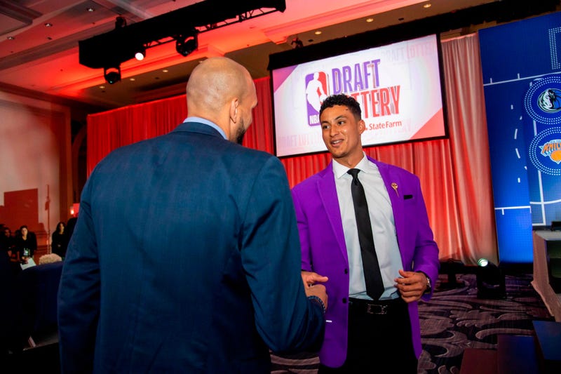 May 14, 2019; Chicago, IL, USA; Los Angeles Lakers player Kyle Kuzma (right) is seen during the 2019 NBA Draft Lottery at the Hilton Chicago. Mandatory Credit: Patrick Gorski-USA TODAY Sports