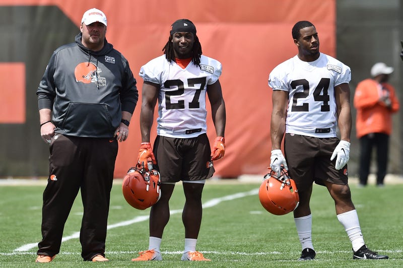 May 15, 2019; Berea, OH, USA; Cleveland Browns head coach Freddie Kitchens (left) and running back Kareem Hunt (27) and running back Nick Chubb (24) during organized team activities at the Cleveland Browns training facility. Mandatory Credit: Ken Blaze-US