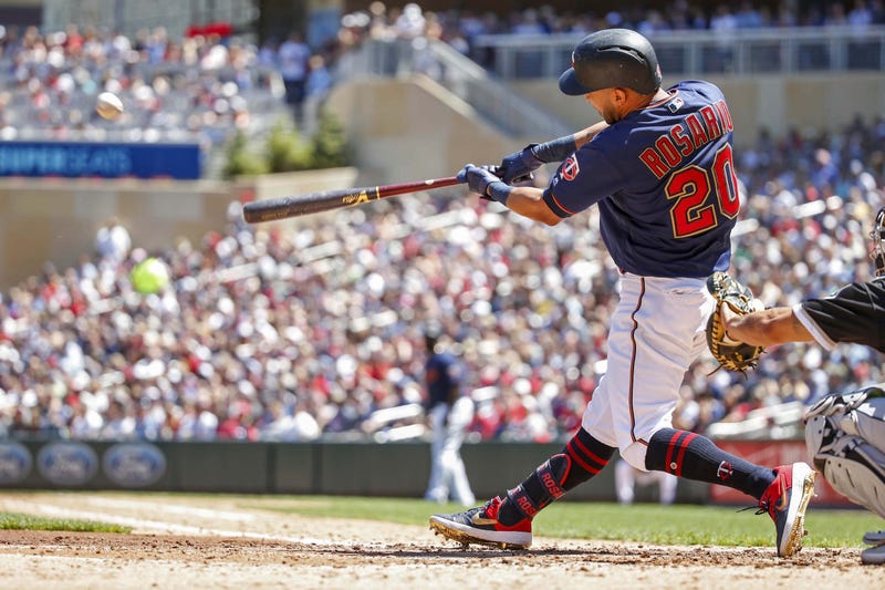 Minnesota Twins designated hitter Eddie Rosario (20) hits a three run home run against the Chicago White Sox in the third inning at Target Field.
