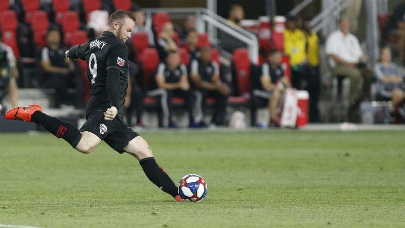 D.C. United's Wayne Rooney scores an absurd goal from his own half.
