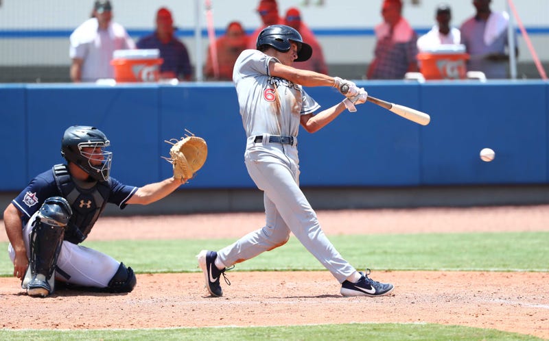 Jun 21, 2019; Bradenton, FL, USA; Team Jeter outfielder Petey Halpin (6) reaches base on error during the third inning at IMG Academy.