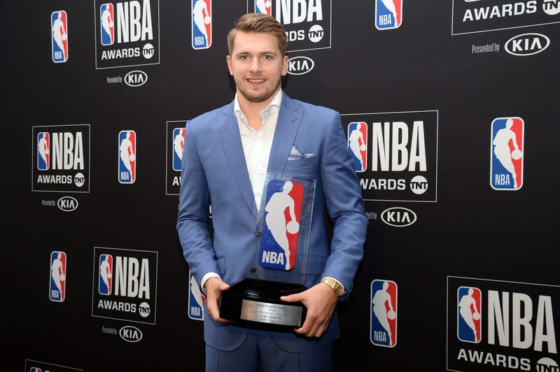 Dallas Mavericks guard Luka Doncic poses with Rookie Of The Year award at the 2019 NBA Awards