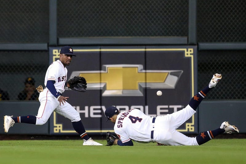 George Springer dives and misses