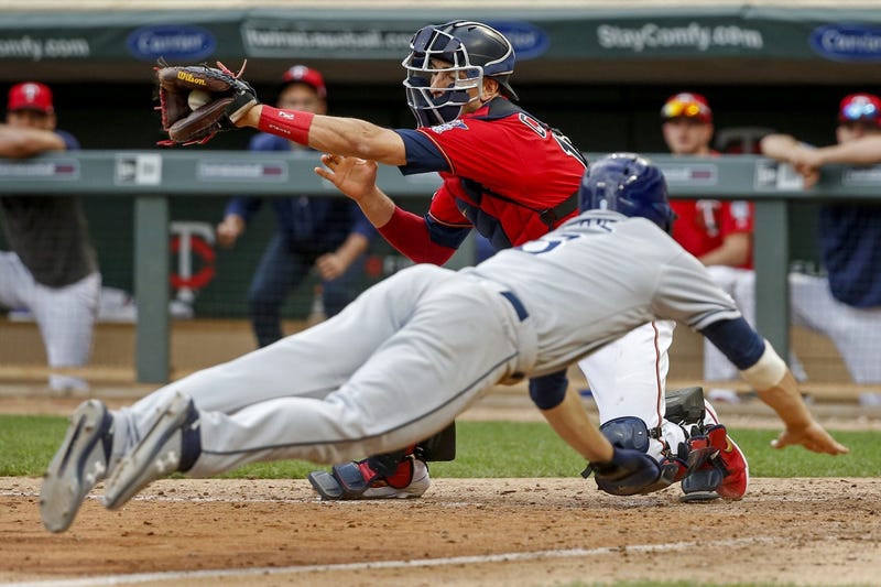 Jason Castro tries for the tag