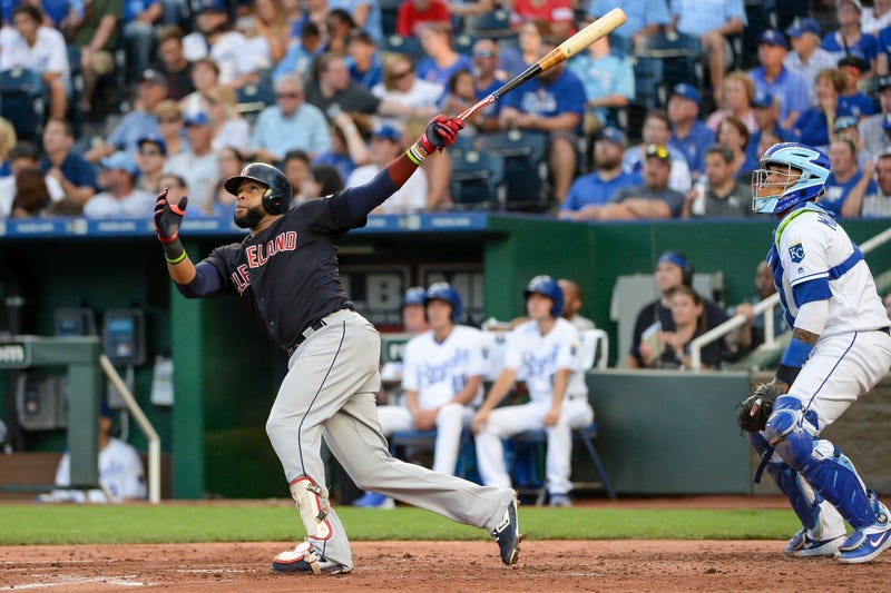 Cleveland Indians first baseman Carlos Santana (41) follows through on a swing for a home run in the fourth inning against the Kansas City Royals at Kauffman Stadium.