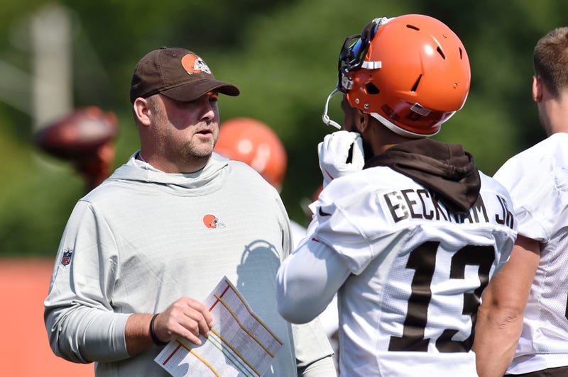 Cleveland Browns head coach Freddie Kitchens talks with wide receiver Odell Beckham (13) during training camp at the Cleveland Browns Training Complex.