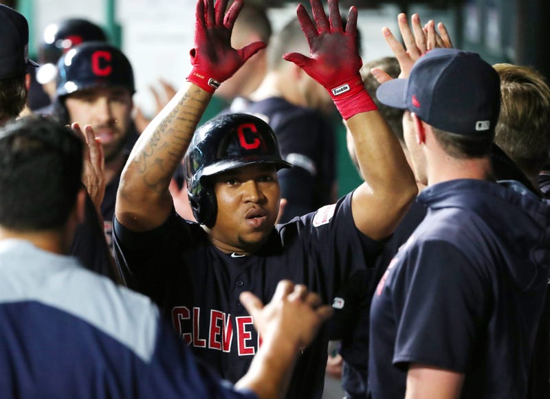 Cleveland Indians designated hitter Jose Ramirez (11) is congratulated after hitting a home run against the Kansas City Royals during the sixth inning at Kauffman Stadium.