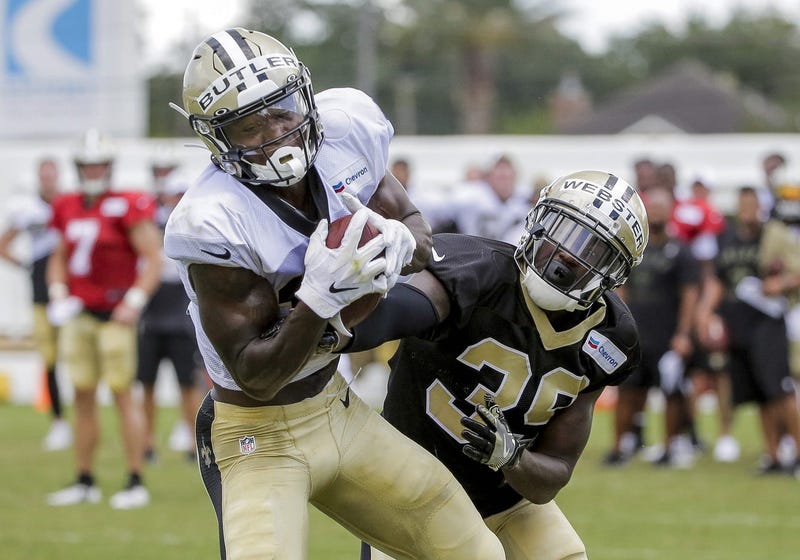 Jul 28, 2019; Metairie, LA, USA; New Orleans Saints wide receiver Emmanuel Butler (17) catches a pass over defensive back Kayvon Webster (39) during training camp at the Ochsner Sports Performance Center.