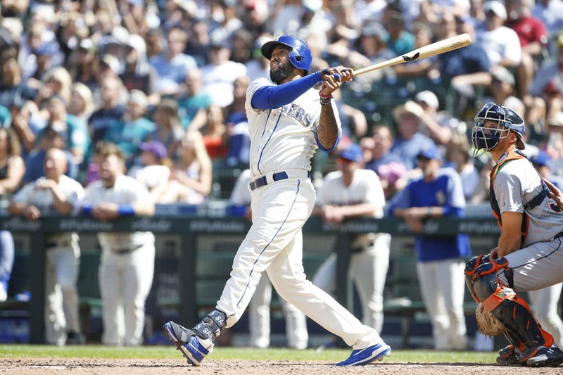 Jul 28, 2019; Seattle, WA, USA; Seattle Mariners right fielder Domingo Santana (16) hits a solo-home run against the Detroit Tigers during the eighth inning at T-Mobile Park. Mandatory Credit: Joe Nicholson-USA TODAY Sports