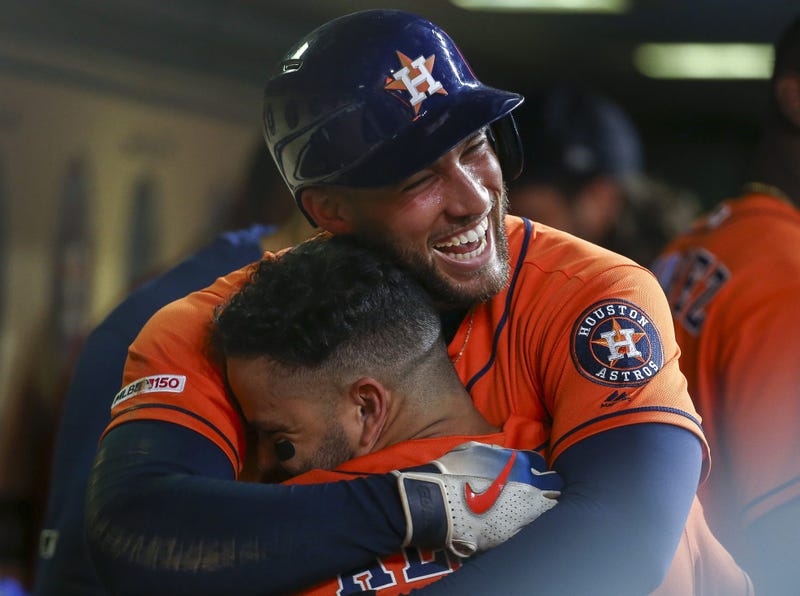 Springer, Altuve hug