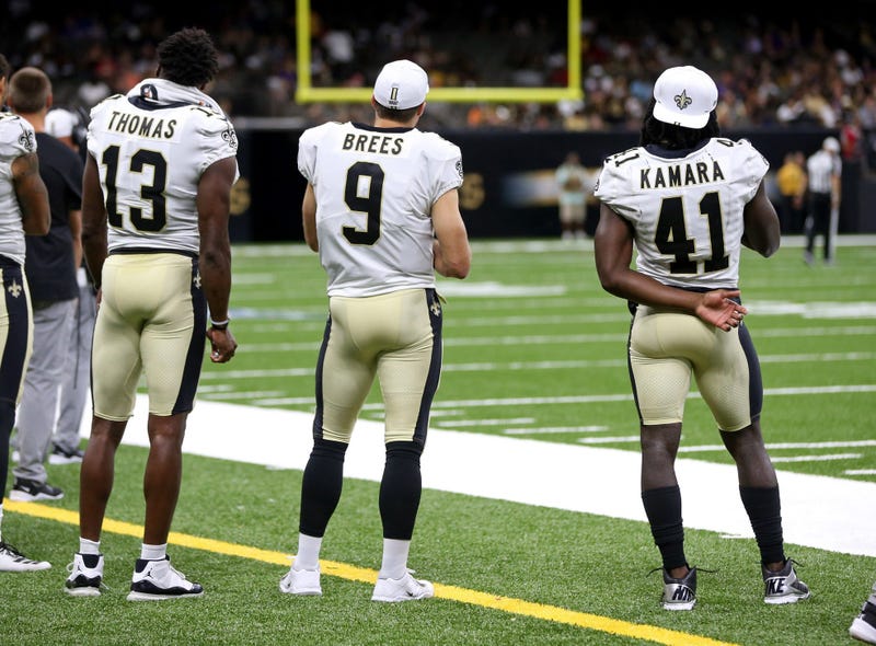 Aug 9, 2019; New Orleans, LA, USA; New Orleans Saints wide receiver Michael Thomas (13) and quarterback Drew Brees (9) and running back Alvin Kamara (41) stand on the sidelines in the second half against the Minnesota Vikings at the Mercedes-Benz Superdom