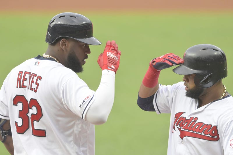 Aug 12, 2019; Cleveland, OH, USA; Cleveland Indians designated hitter Franmil Reyes (32) celebrates his two-run home run with first baseman Carlos Santana (41) in the first inning against the Boston Red Sox at Progressive Field. Mandatory Credit: David Ri