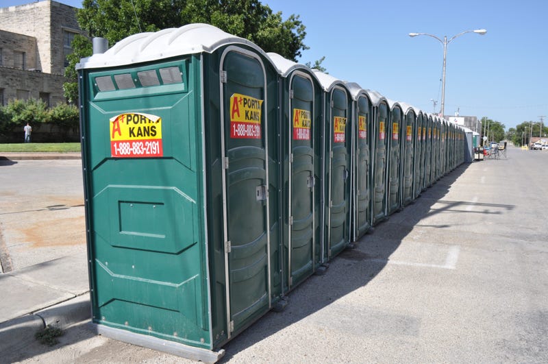 Portable toilets are lined up on the Comanche County Courthouse square Wednesday, Aug. 21, 2019, as the city conserves water while recovering from a major water line break. Comanche Water Dsc 7682