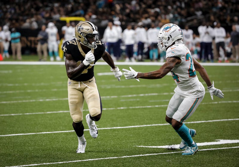 Aug 29, 2019; New Orleans, LA, USA; New Orleans Saints wide receiver Emmanuel Butler (17) runs past Miami Dolphins cornerback Torry McTyer (24) on a touchdown play during a preseason game at the Mercedes-Benz Superdome.