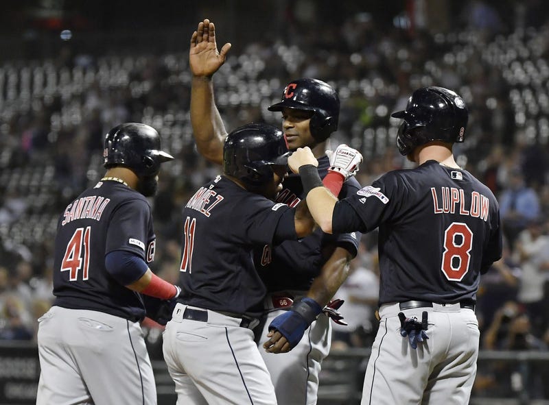 Sep 24, 2019; Chicago, IL, USA; Cleveland Indians third baseman Jose Ramirez (11) is congratulated by teammates after his grand slam in the first inning against the Chicago White Sox at Guaranteed Rate Field. Mandatory Credit: Quinn Harris-USA TODAY Sport