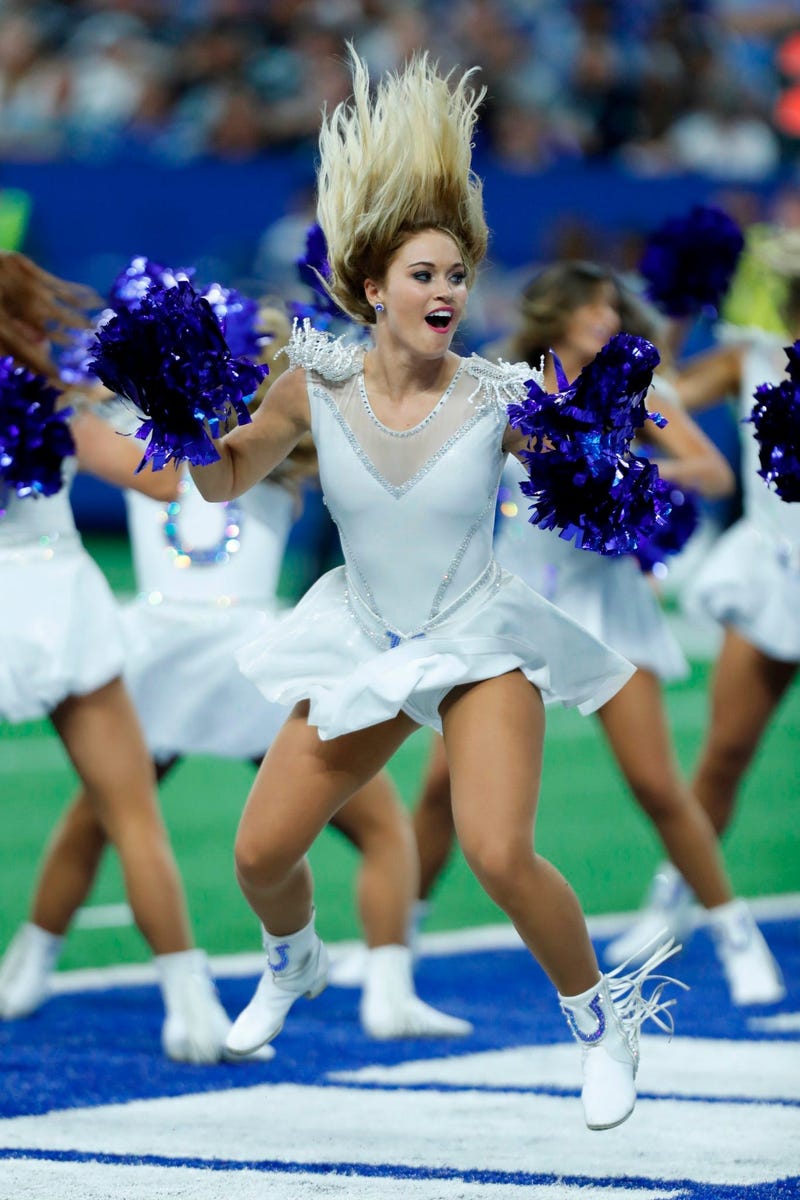 Sep 29, 2019; Indianapolis, IN, USA; Indianapolis Colts cheerleader performs a cheer in a game against the Oakland Raiders during the fourth quarter at Lucas Oil Stadium. Mandatory Credit: Brian Spurlock-USA TODAY Sports