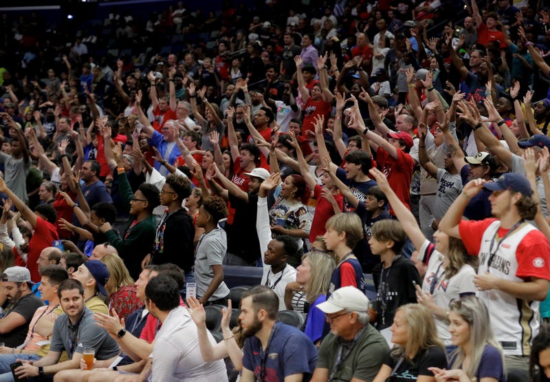  New Orleans Pelicans fans cheer during a open practice at the Smoothie King Center.