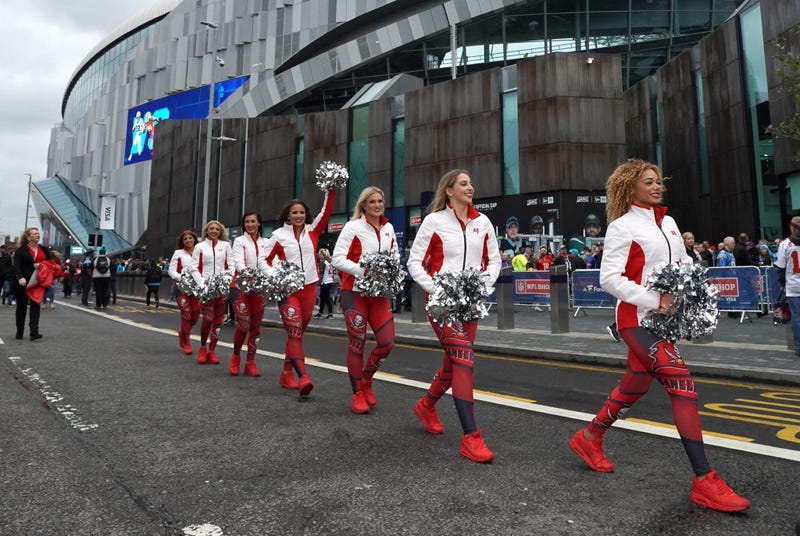 Oct 13, 2019; London, United Kingdom; Tampa Bay Buccaneers cheerleaders walk outside of Tottenham Hotspur Stadium before an NFL International Series game against the Carolina Panthers. Mandatory Credit: Kirby Lee-USA TODAY Sports