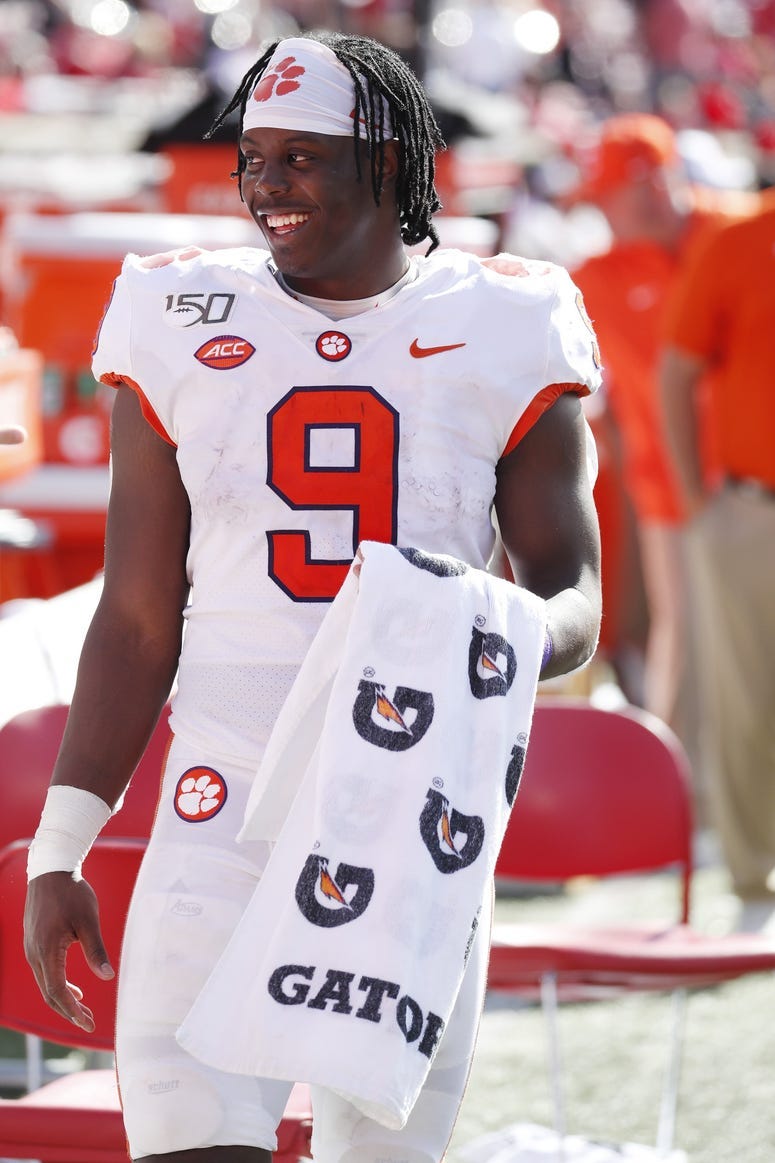 Clemson Tigers running back Travis Etienne (9) looks on from the sidelines against the Louisville Cardinals during the fourth quarter at Cardinal Stadium.