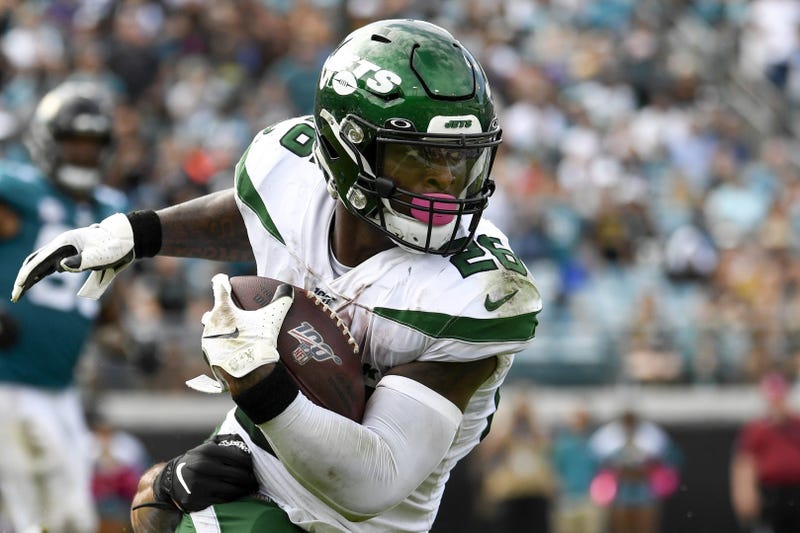 Oct 27, 2019; Jacksonville, FL, USA; New York Jets running back Le'Veon Bell (26) runs the ball during the fourth quarter against the Jacksonville Jaguars at TIAA Bank Field. Mandatory Credit: Douglas DeFelice-USA TODAY Sports
