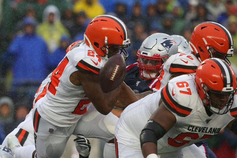 Cleveland Browns running back Nick Chubb (24) fumbles the ball during the first quarter against the New England Patriots at Gillette Stadium.