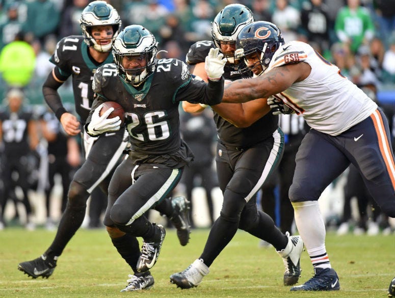 Philadelphia Eagles running back Jordan Howard (24) runs past Chicago Bears nose tackle Eddie Goldman (91) during the fourth quarter at Lincoln Financial Field.