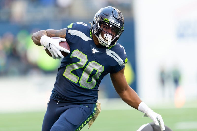 Nov 3, 2019; Seattle, WA, USA; Seattle Seahawks running back Rashaad Penny (20) carries the ball against the Tampa Bay Buccaneers during the second half at CenturyLink Field. Seattle defeated Tampa Bay 40-34. Mandatory Credit: Steven Bisig-USA TODAY Sport