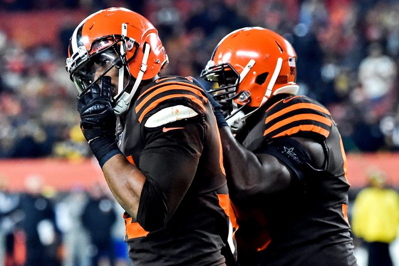 Cleveland Browns defensive end Myles Garrett (left)