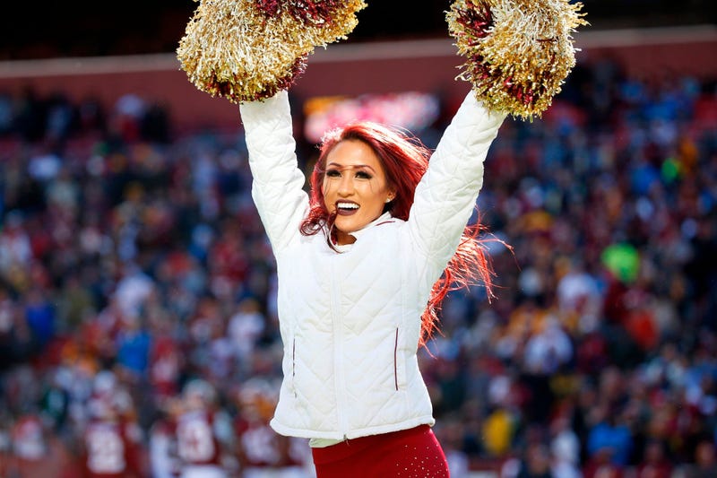 Nov 24, 2019; Landover, MD, USA; A Washington Redskins cheerleader performs on the field after the Redskins' score a touchdown against the Detroit Lions during the first half at FedExField. Mandatory Credit: Amber Searls-USA TODAY Sports