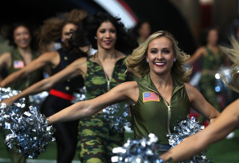 Nov 24, 2019; Atlanta, GA, USA; Atlanta Falcons cheerleaders run onto the field before the Atlanta Falcons' game against the Tampa Bay Buccaneers at Mercedes-Benz Stadium. Mandatory Credit: Jason Getz-USA TODAY Sports