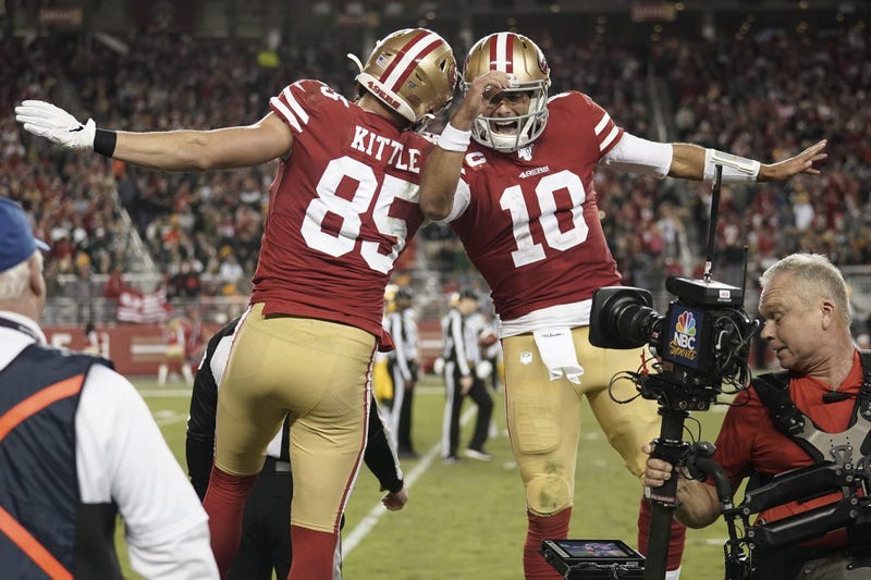George Kittle and Jimmy Garoppolo celebrate win