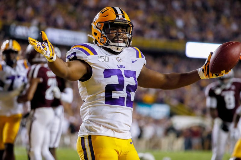 Nov 30, 2019; Baton Rouge, LA, USA; LSU Tigers running back Clyde Edwards-Helaire (22) reacts after scoring on a five yard touchdown against the Texas A&M Aggies during the first quarter at Tiger Stadium. Mandatory Credit: Stephen Lew-USA TODAY Sports