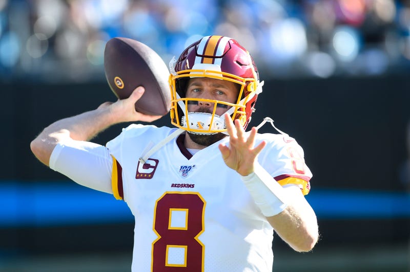 Washington Redskins quarterback Case Keenum (8) warms up in the second quarter at Bank of America Stadium. 